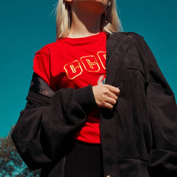 @tanvi.wears: Red for the rally, black for the vibe.